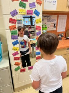 Student Looking in Mirror