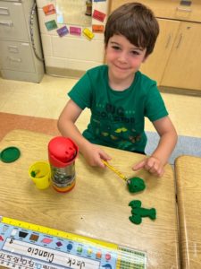 Boy making sculpture