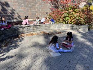 Children doing math in the garden