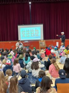 Mr. Mulcahy reading to students