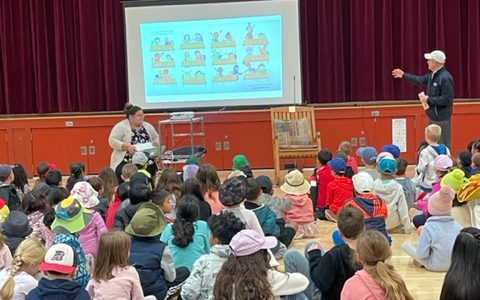 Mr. Mulcahy reading to students