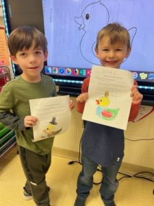 Students with duck drawings