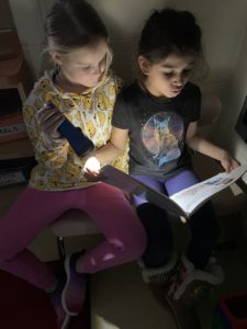 Students with flashlights