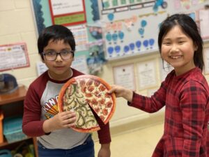 Students with "pizza" slices