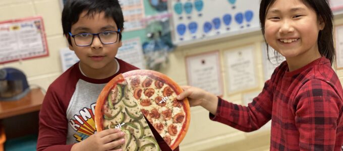 Students with "pizza" slices