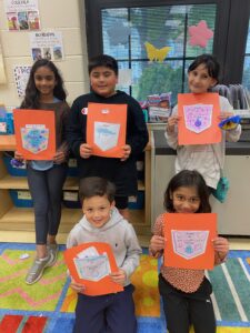 Student with Poem Folders