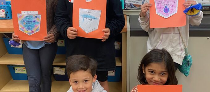 Student with Poem Folders