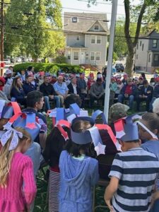 Vets around American Flag