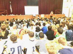 Ms. Gardeazabal reading to students