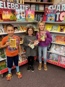 Student shopping at book fair