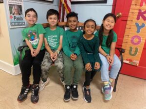 Students with green shirts