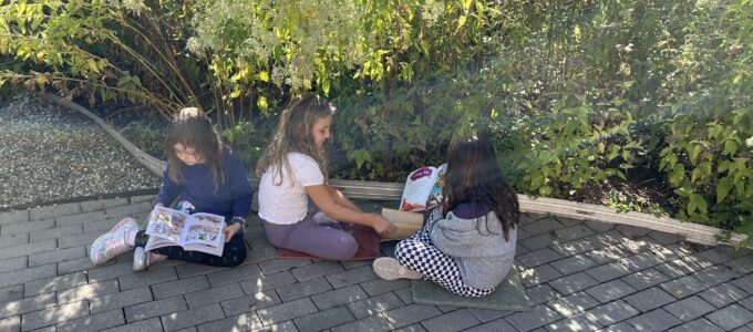 Students Reading in the Garden