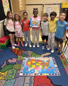 Students displaying State of the Week