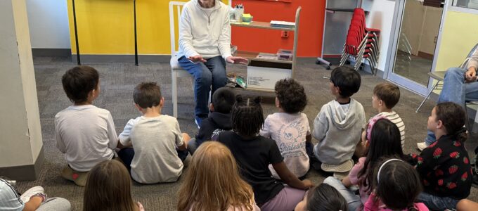 Students listing to a story at the library