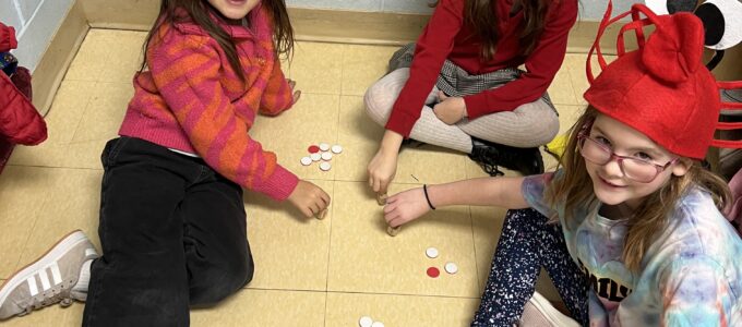 Students playing dreidel
