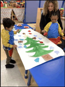 Students creating mural
