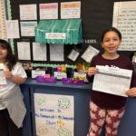 2 girls at class store