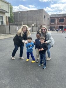 Miss Megan and Miss Michelle with 3 students