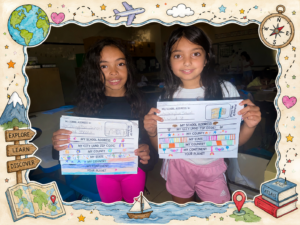 2 girls showing their work