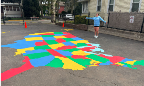 Girl by playground map
