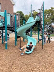 Student on slide