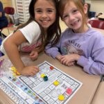 2 girls with math game