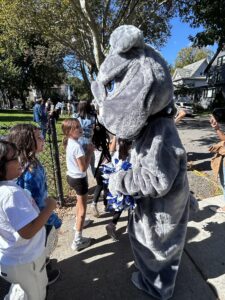 Bulldog mascot with students
